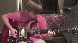 9-Year-OId Boy Picks Up Guitar, But What He Does Next Is Mindblowing