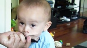Baby Tries To Play Harmonica With His Dad, And It Will Have You Rolling On The Floor