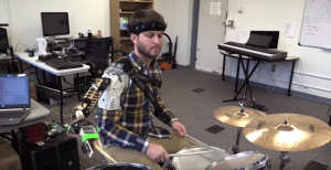 Need An Extra Hand? This Wearable Robotic Limb Makes Thrashing Easier For Drummers