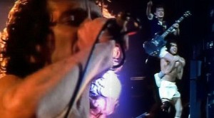 Remember When Angus Young Played A Solo On Bon’s Shoulders? We Do, And It Was Awesome