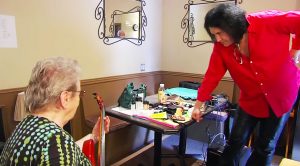 Gene Simmons Hands Bass To 83 Year Old Woman – Immediately Gets Schooled