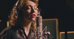 Singer Turns “While My Guitar Gently Weeps” Into A Haunting Lullaby For The Next Generation
