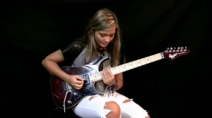 Teen Girl Takes Jason Becker “Altitudes” Guitar Solo To Another Level- Look At Her Fingers Go