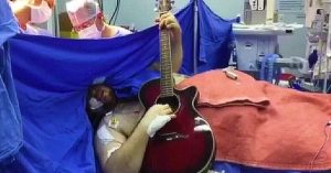 Beatles Fan Jams “Yesterday” On Guitar While Undergoing Brain Surgery