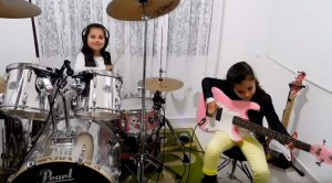 Two 7-Year-Old Twin-Sisters Nail This Cover Of Pink Floyd’s ‘Another Brick In The Wall’!