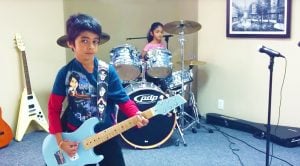 Brother And Sister Team Up For Fantastic Guitar And Drum Duet Of This AC/DC Classic!