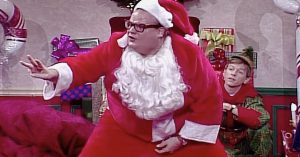 Things Get Awkward (And Hilarious) When Chris Farley’s ‘Motivational Santa’ Comes Crashing Into Town