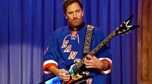 Hockey Player Trades In Stick For Guitar, And Shreds Insane Solo That Leaves The Crowd Speechless!