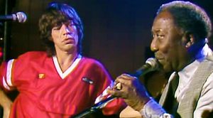 Mick Jagger Gives Crowd Surprise Of A Lifetime—Joins Muddy Waters On Stage For Legendary Duet!