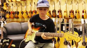 Kid Wanders Into Guitar Shop, Starts To Play, And Leaves Everyone With Their Jaws On The Floor!
