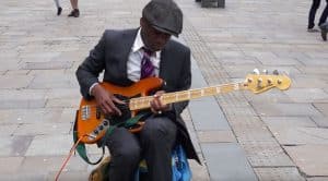 Street Performer Uses Bass Guitar To Channel Jimi Hendrix And We Can’t Stop Watching!