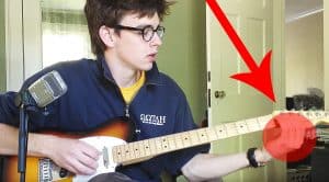 Young Man Films Himself Playing “Sultans Of Swing” – But Keep Your Eye On His Left Hand