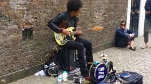 One Man Band Plugs In On A Busy Sidewalk – What Happened Next Turned Him Into A Viral Sensation