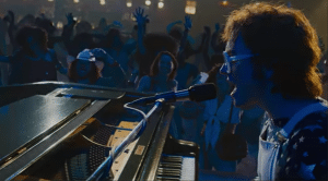 ‘Rocketman’ Actor Belts Elton John’s “Tiny Dancer” In Explosive New Trailer
