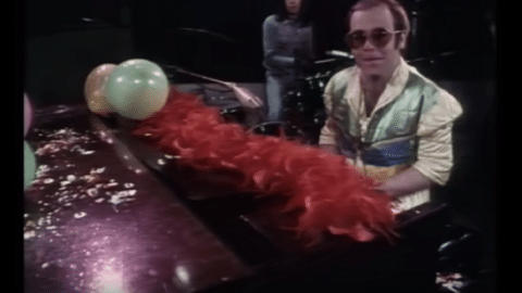 Song Review: “Step Into Christmas” by Elton John | Society Of Rock Videos