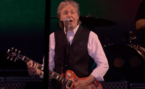 Watch Paul McCartney Duet With Virtual John Lennon In Glastonbury