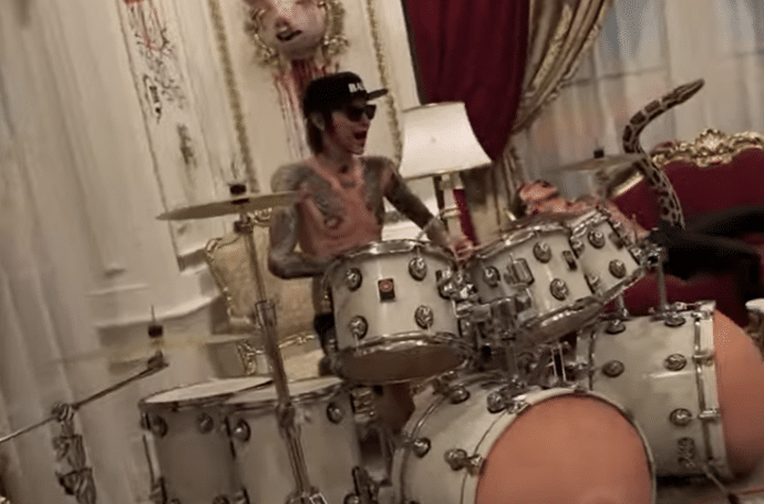 Watch Tommy Lee's Collaboration With Wife Brittany Furlan 'Bouncy Castle'