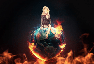 Rock Out To Dolly Parton’s New Song “World On Fire” – Nicole