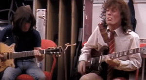 Watch AC/DC Backstage Delight: Rare 1983 Footage with Hell’s Bells and Unexpected Trombone