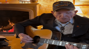 Watch a WW2 Veteran Revisit Normandy and Share Memories with a Guitar in Hand