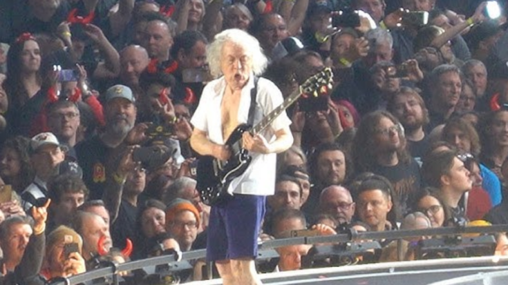 Angus Young of AC/DC performing “For Those About to Rock (We Salute You)” live at U.S. Bank Stadium in Minneapolis on April 10.