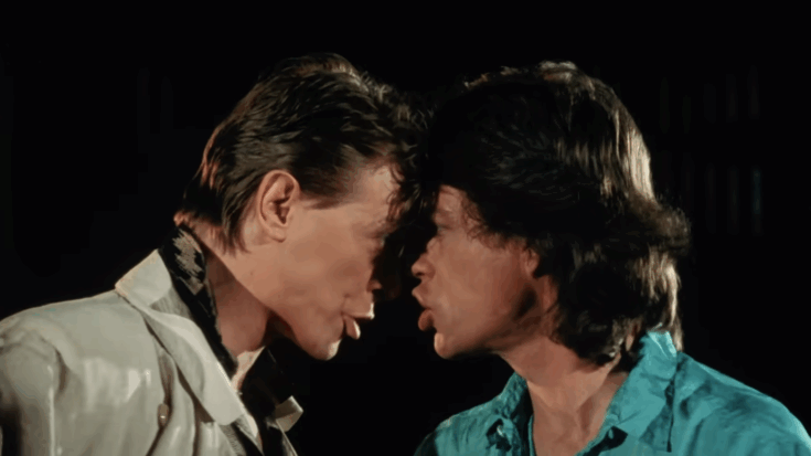 David bowie and Mick Jagger looking at each other