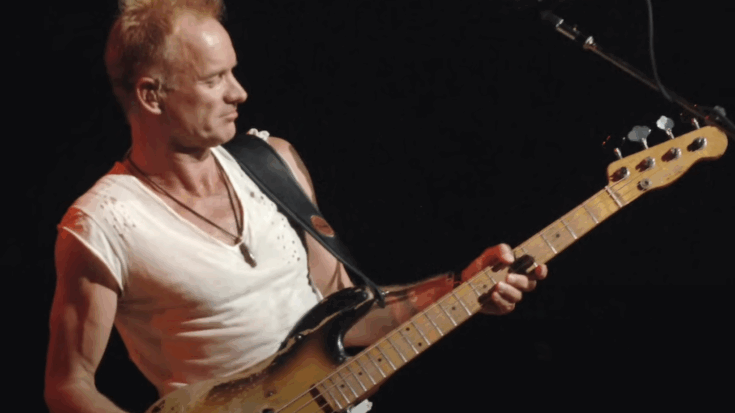 Sting playing his 1950s precision bass wearing a white shirt
