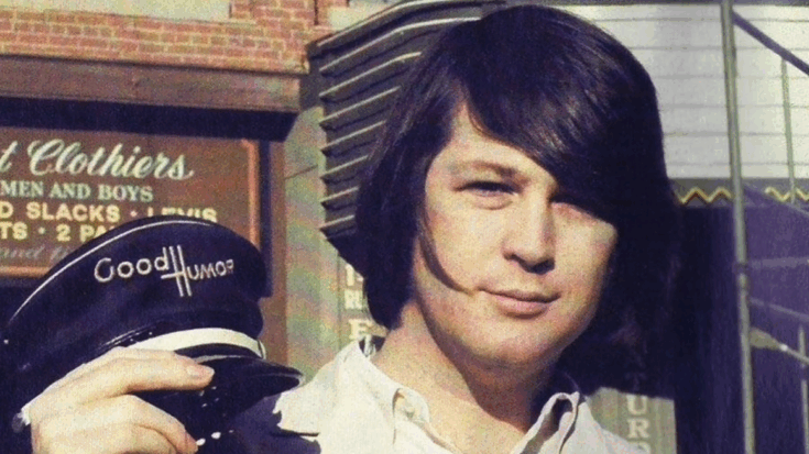 Brian Wilson of The Beach Boys holding a Good Humor cap during a casual moment in the 1960s
