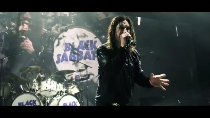 Ozzy osbourne singing on stage with black sabbath