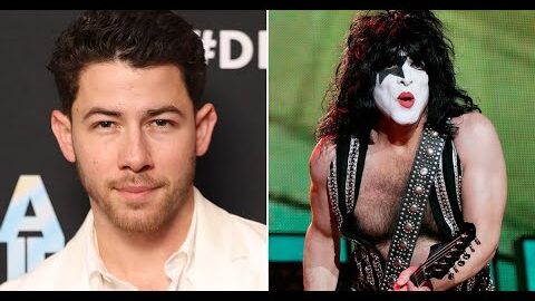 Nick Jonas and Paul Stanley side by side