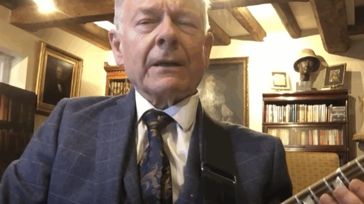 Robert Fripp holding a lespaul