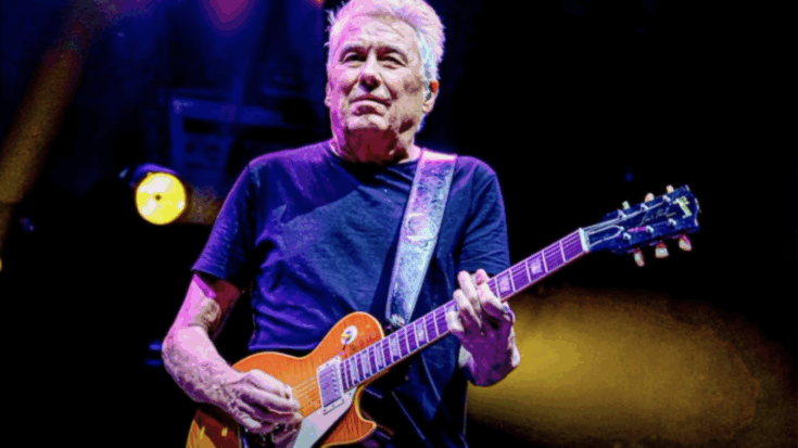 George Kooymas playing his les paul guitar