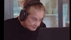 ozzy osbourne wearing a headphones
