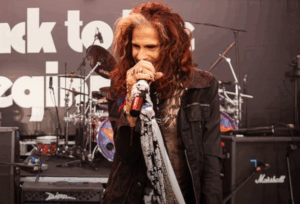Steven Tyler Kisses the First Lady of Metal—Ozzy Might Need a Word