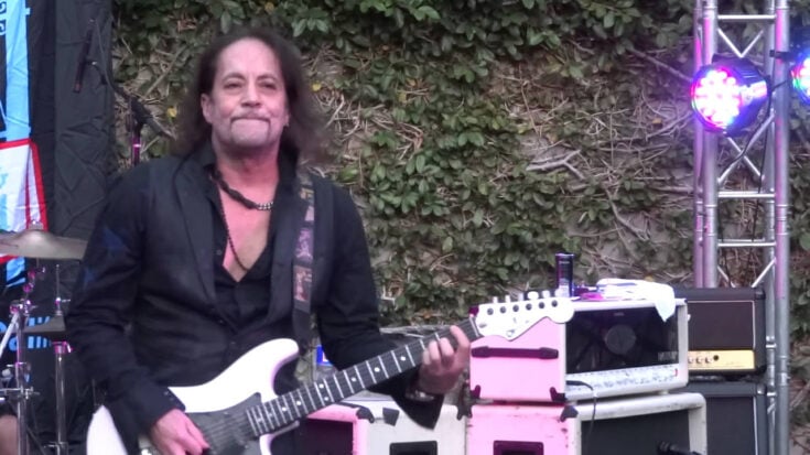 Jake E Lee playing an ibanez guitar