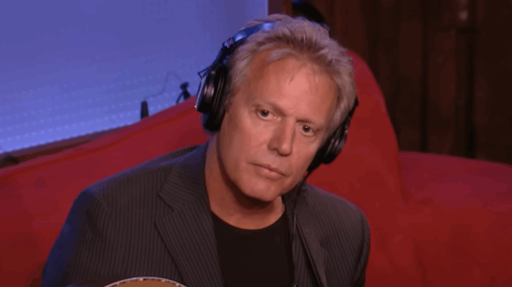 Don Felder sitting in a red couch