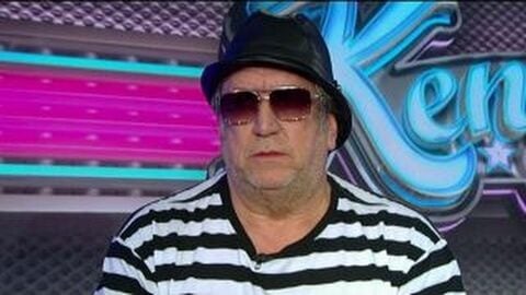 steve jones wearing a black and white shirt with shades