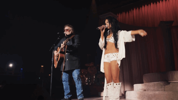 Don McLean plays guitar while Jessie Murph sings during their duet of 