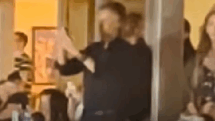 Paul McCartney recording Oasis reunion concert performance from the audience