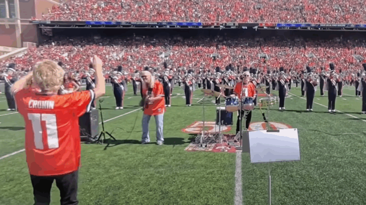 REO Speedwagon performs with the Marching Illini during halftime at the Illinois vs USC football game on September 27, 2025.