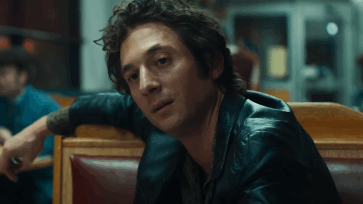 Actor Jeremy Allen in a leather jacket sitting in a diner scene from Springsteen: Deliver Me From Nowhere (2025) official trailer.