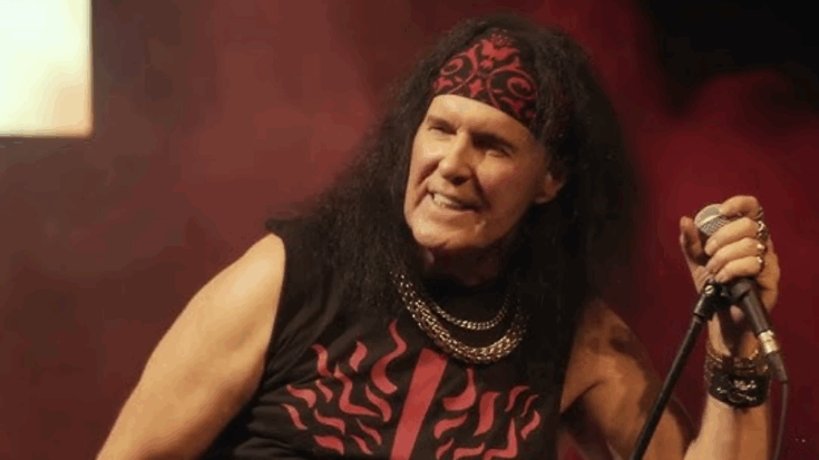 Dave Evans performs on stage celebrating 50 years in rock with his signature hard rock energy.