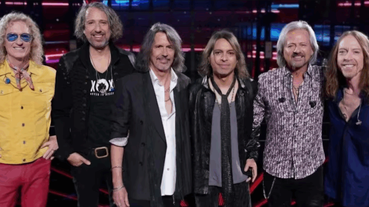 Foreigner band members together during their reunion tour performance