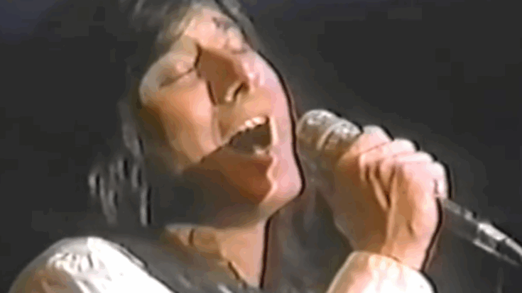 Steve Perry passionately singing into a microphone during Journey’s performance of “Winds of March” on Soundstage at the Aragon Ballroom in Chicago, June 9, 1978.