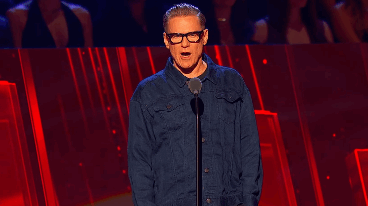 Bryan Adams delivering a heartfelt tribute to Joe Cocker during the Rock and Roll Hall of Fame induction ceremony.
