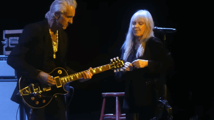 Pat Benatar performing live with Neil Giraldo at Xfinity Mobile Arena in Philadelphia on October 29, 2025, delivering a full high-energy classic rock set.