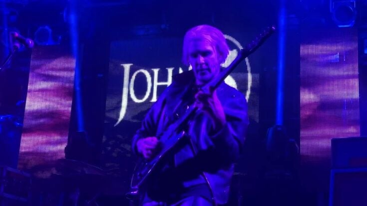 John 5 playing his guitar