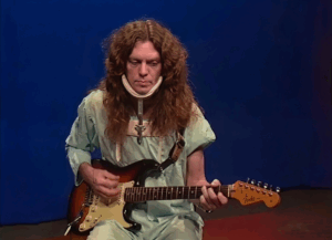 Watch: Allen Collins Was Allowed to Play Guitar in His Hospital Bed After the Plane Crash
