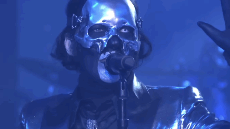 Ghost wearing a mask and performing