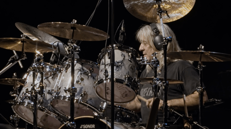 Mikkey Dee playing a drum solo.